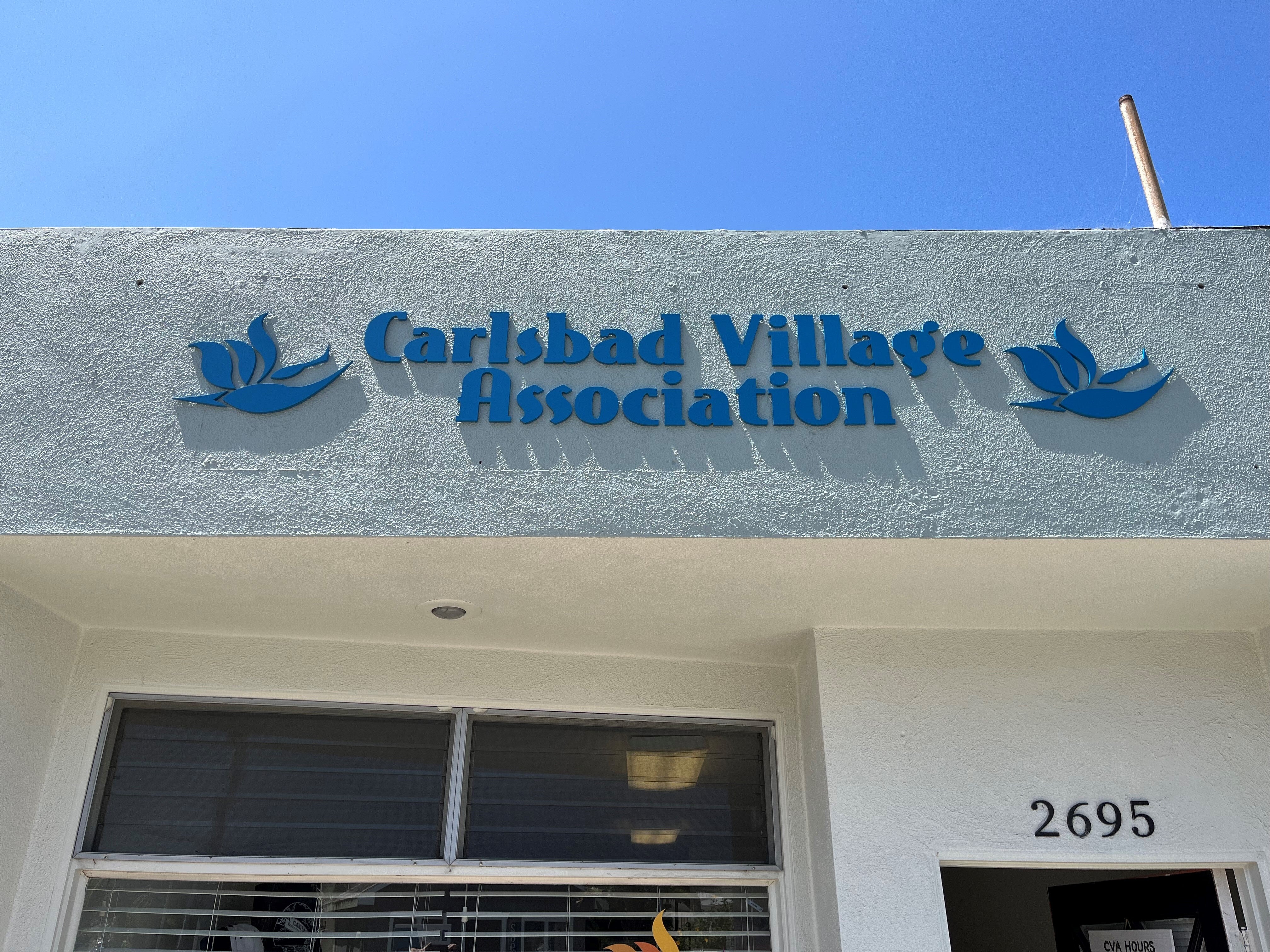 Storefront signage in the heart of the Carlsbad Village