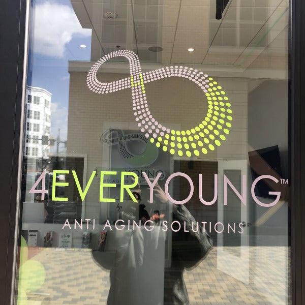 Transforming Storefronts: Vibrant Graphics for 4Ever Young by Signarama Tysons Corner!