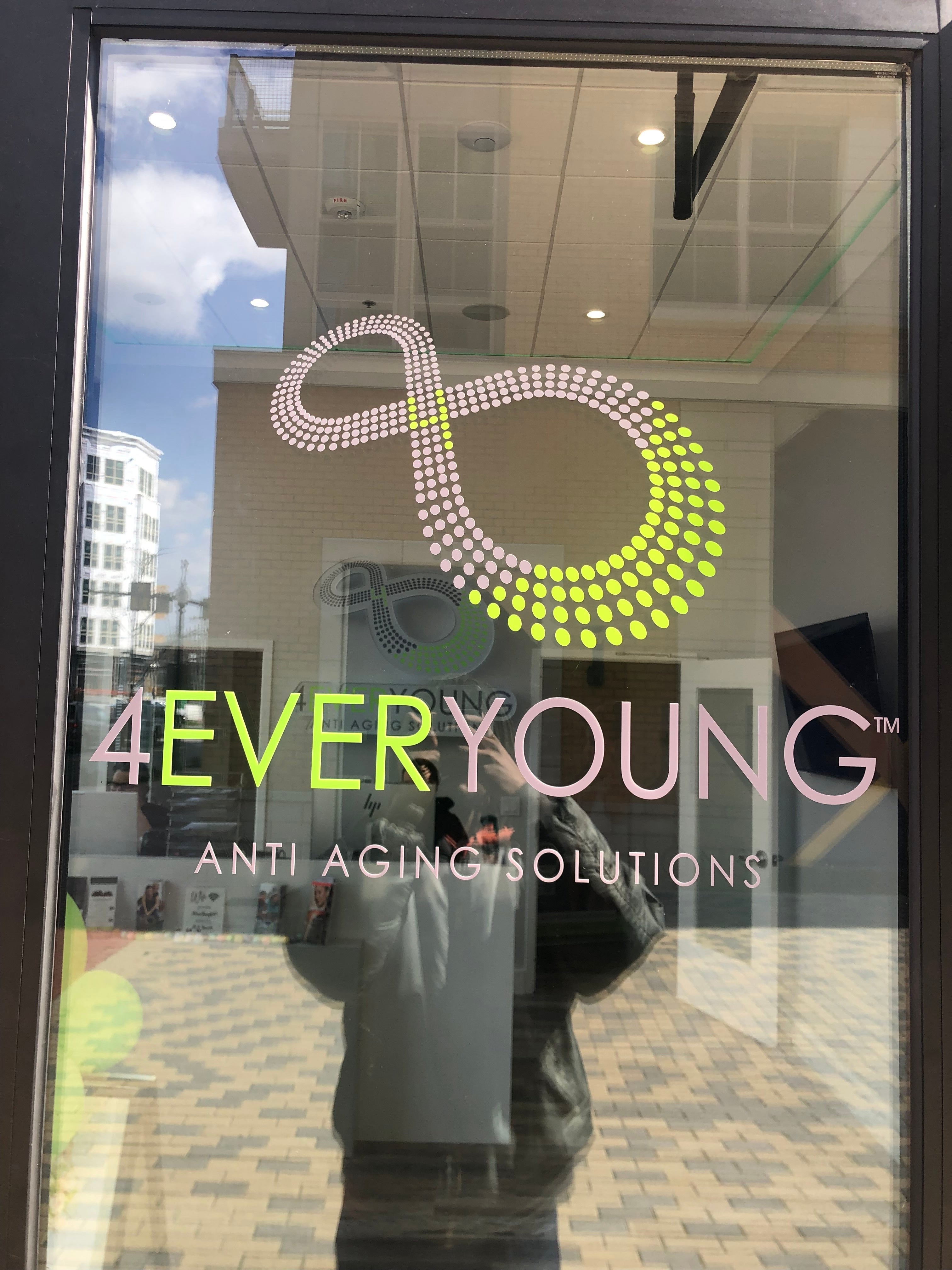 Transforming Storefronts: Vibrant Graphics for 4Ever Young by Signarama Tysons Corner!