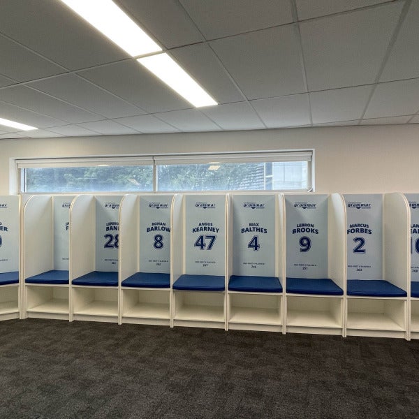 PVC signs indicating player names and numbers on locker cubbies for Brisbane Grammar Basketball Team by Signarama Brendale.