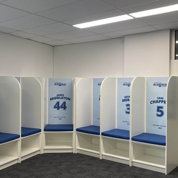 PVC signs indicating player names and numbers on locker cubbies for Brisbane Grammar Basketball Team by Signarama Brendale.