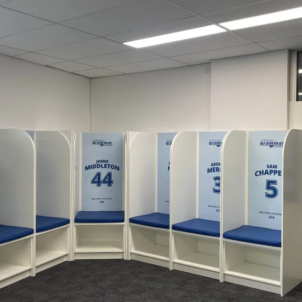 PVC signs indicating player names and numbers on locker cubbies for Brisbane Grammar Basketball Team by Signarama Brendale.