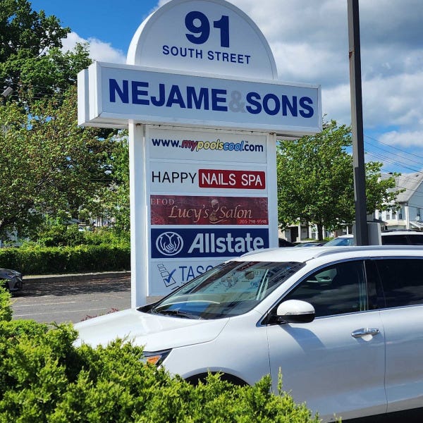 Nejame Pylons Signs