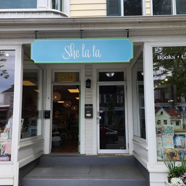 She la la Store Front Sign