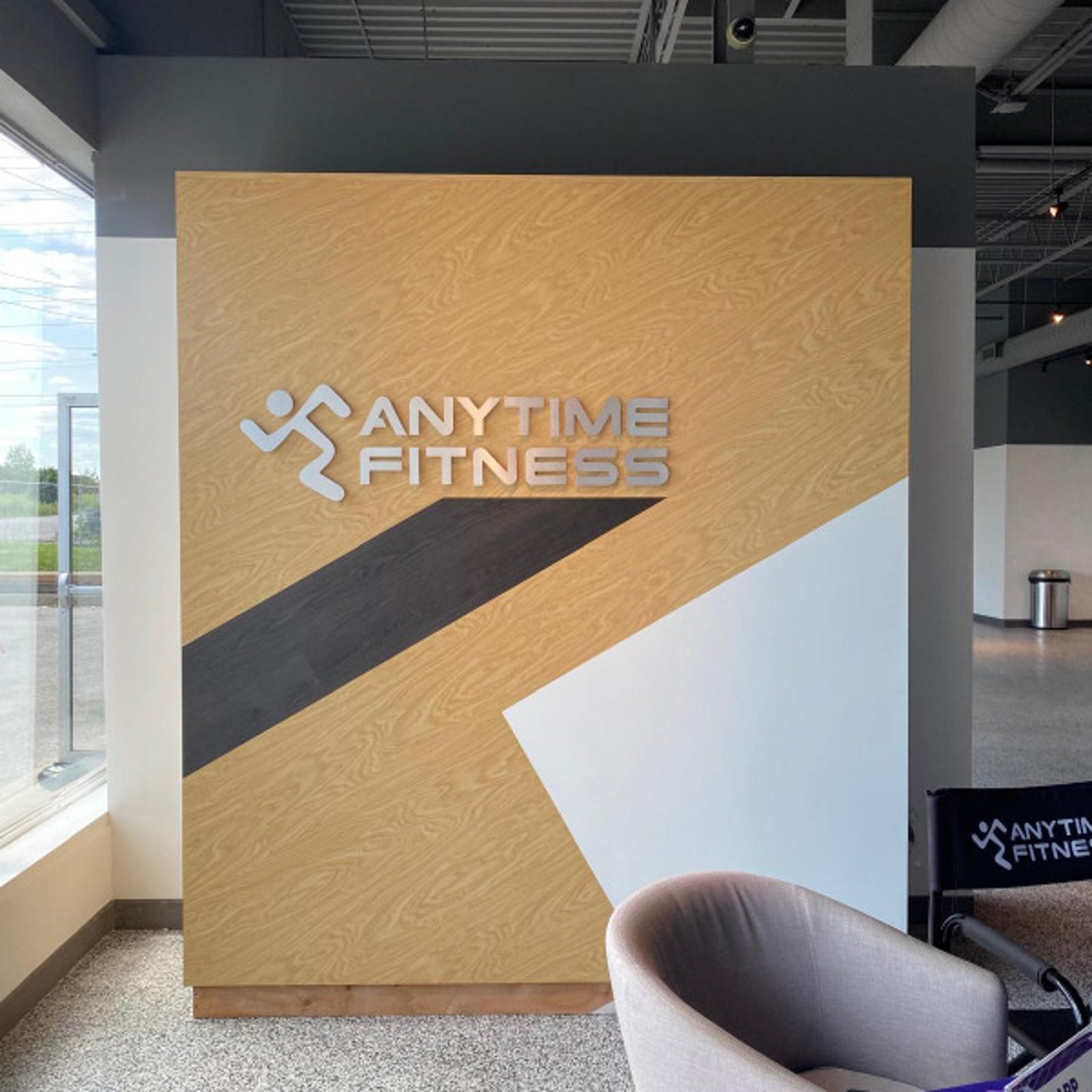 Custom Brushed Silver Sign made for Anytime Fitness in Toronto.