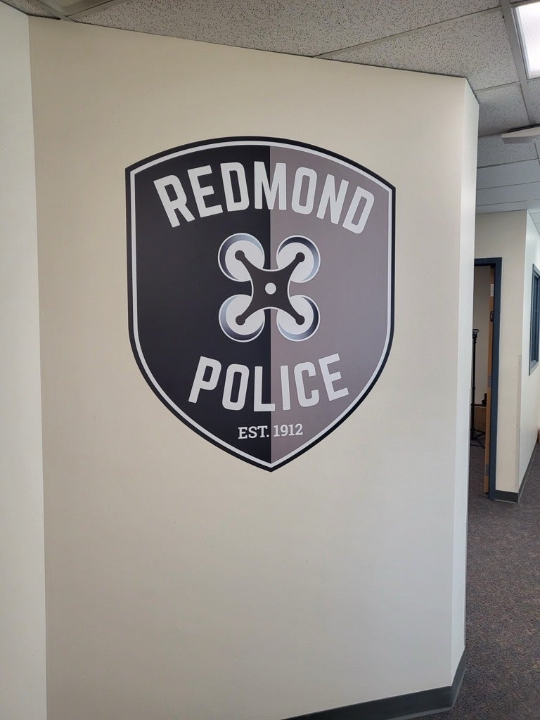 Custom Brand Signs Comes in Various Forms - Redmond Police Drone Dept Gets Brand Treatments, Redmond, WA