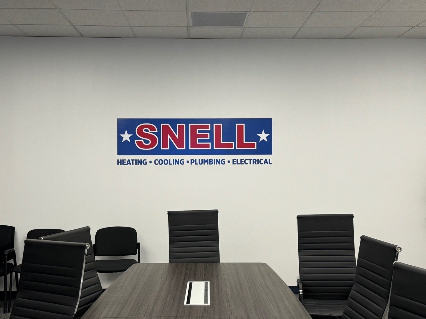 Bringing Sophistication to the Workplace: Signarama Tysons Corner’s Vinyl Graphics Transformation for Snell Heating and Air