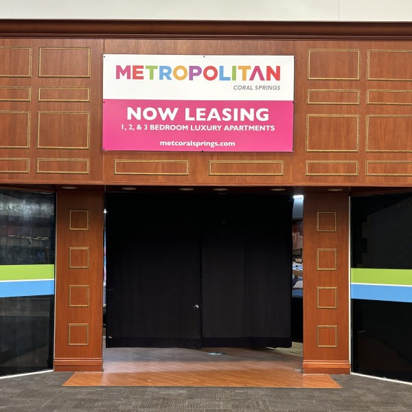 Metropolitan Apartments Mall Leasing Office Signage
