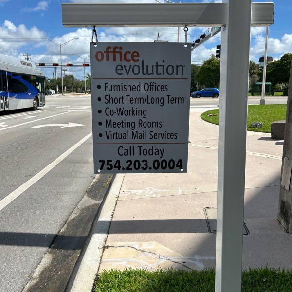 Office Evolution Leasing Sign with Post