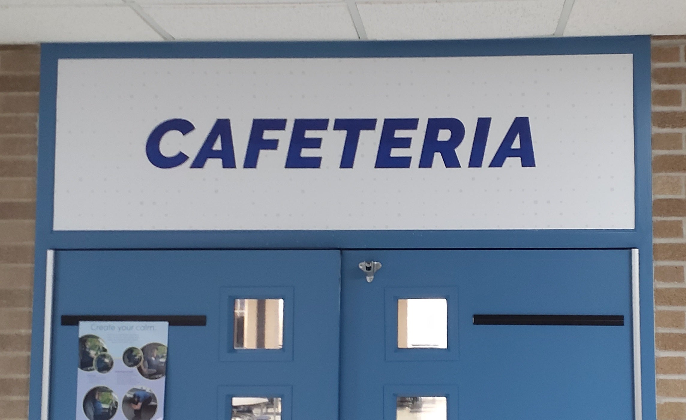 Signage Extravaganza in the Carman-Ainsworth School Kitchens