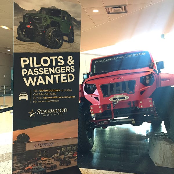 Car Dealership Lobby Sign