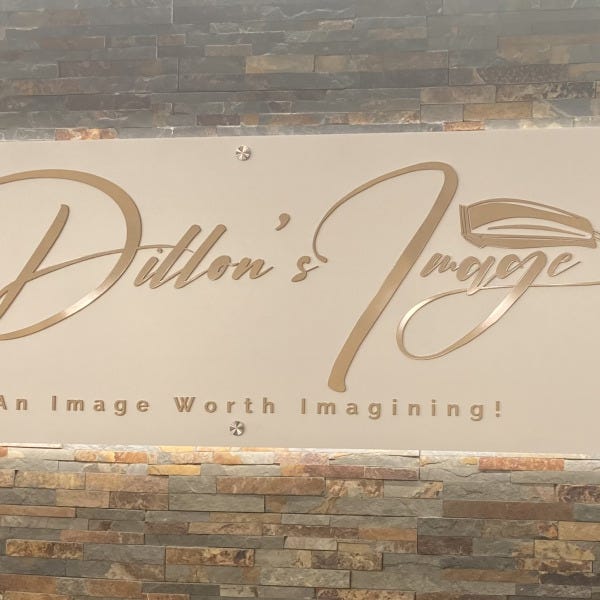 Dutton's Image Lit Sign