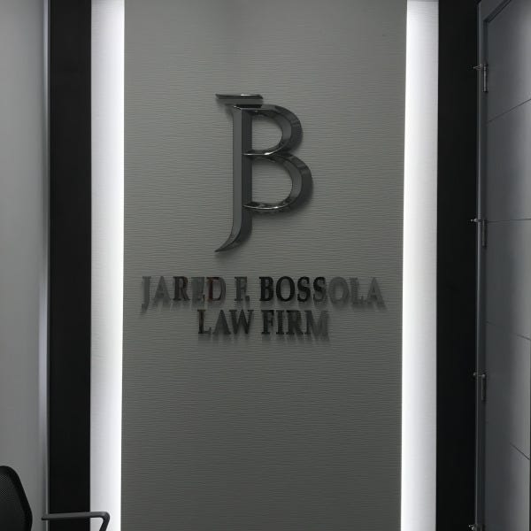 Jared Bossola Law Lit Lobby Sign