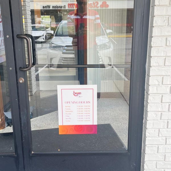 Rangeen Store hours sign