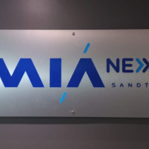 Mia Next acm with vinyl logo close up