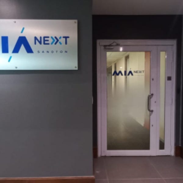 Mia Next acm with vinyl logo