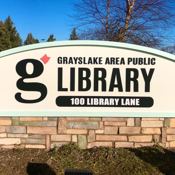 Library-sign-monument-sign-with-stone-base-and-dimensional-letters