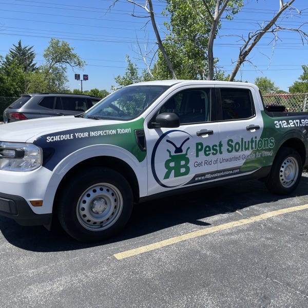 Vehicle-Graphics---Semi-Wrap---Pest-Solutions---Decals---Installation-Services