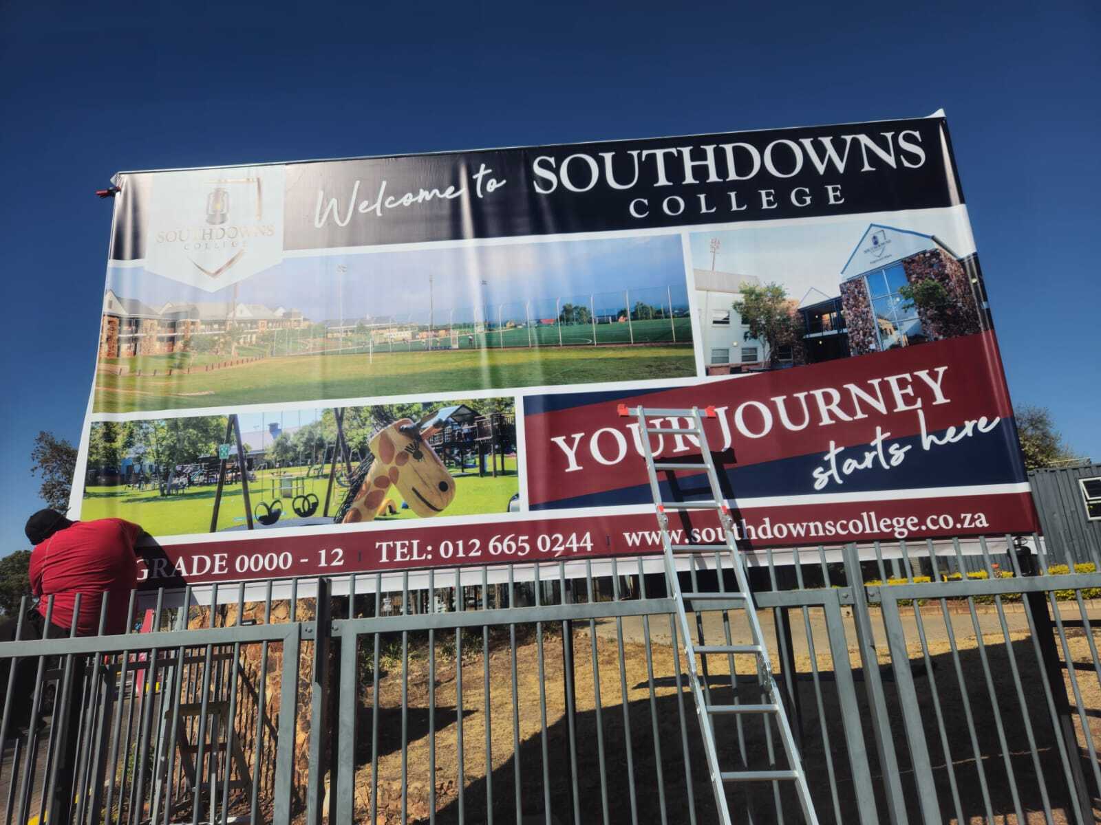 All hands on deck to help with this stunning signage