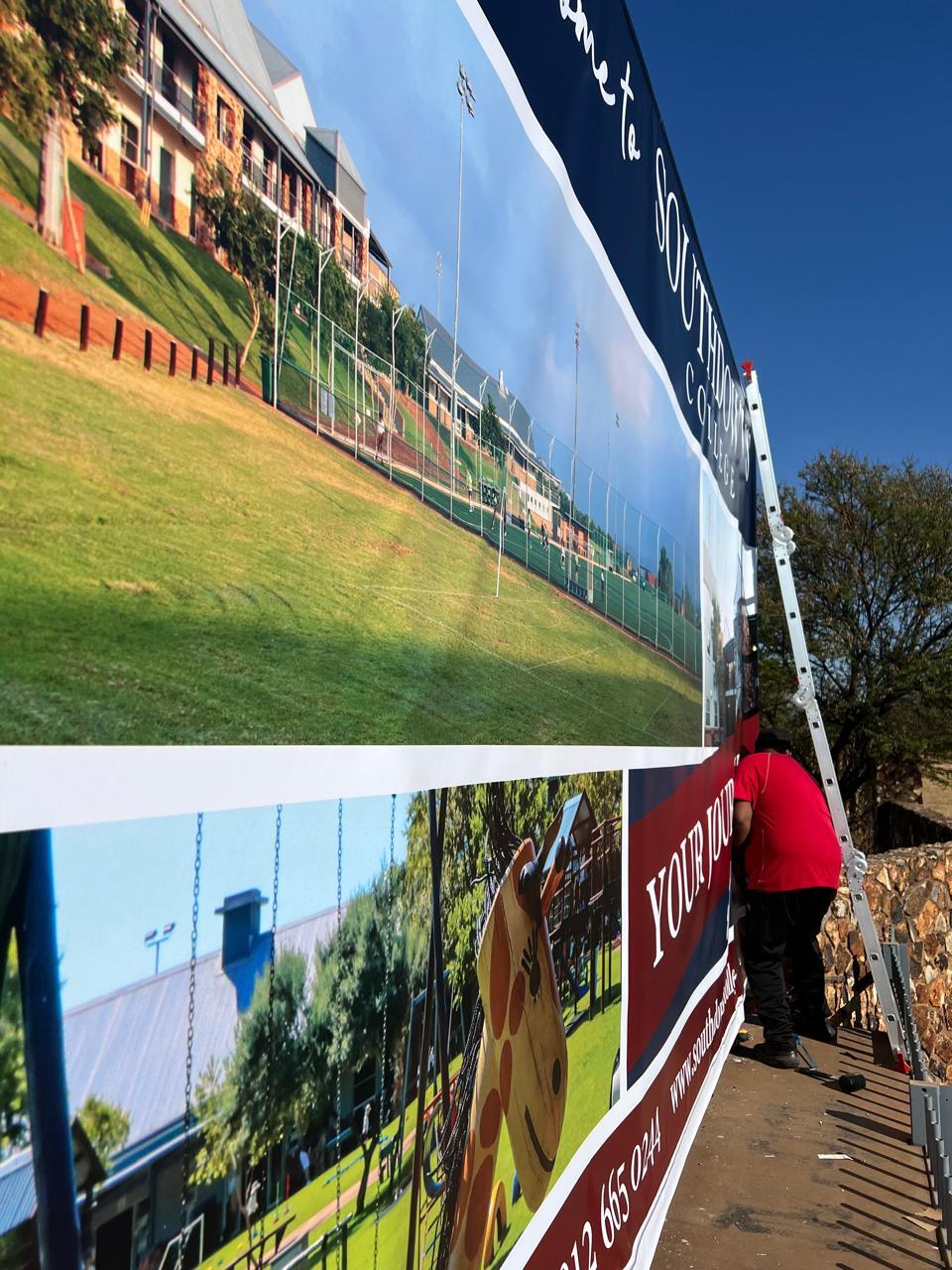 All hands on deck to help with this stunning signage