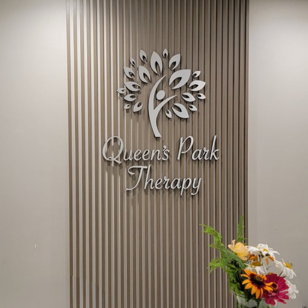 Reception Sign for Queen’s Park Therapy at their Massage Therapy Clinic in New Westminster, BC