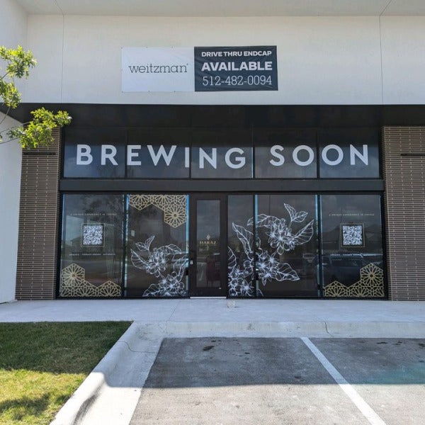 Perforated Window Graphics for Haraz Coffee: Setting the Stage for a Grand Opening