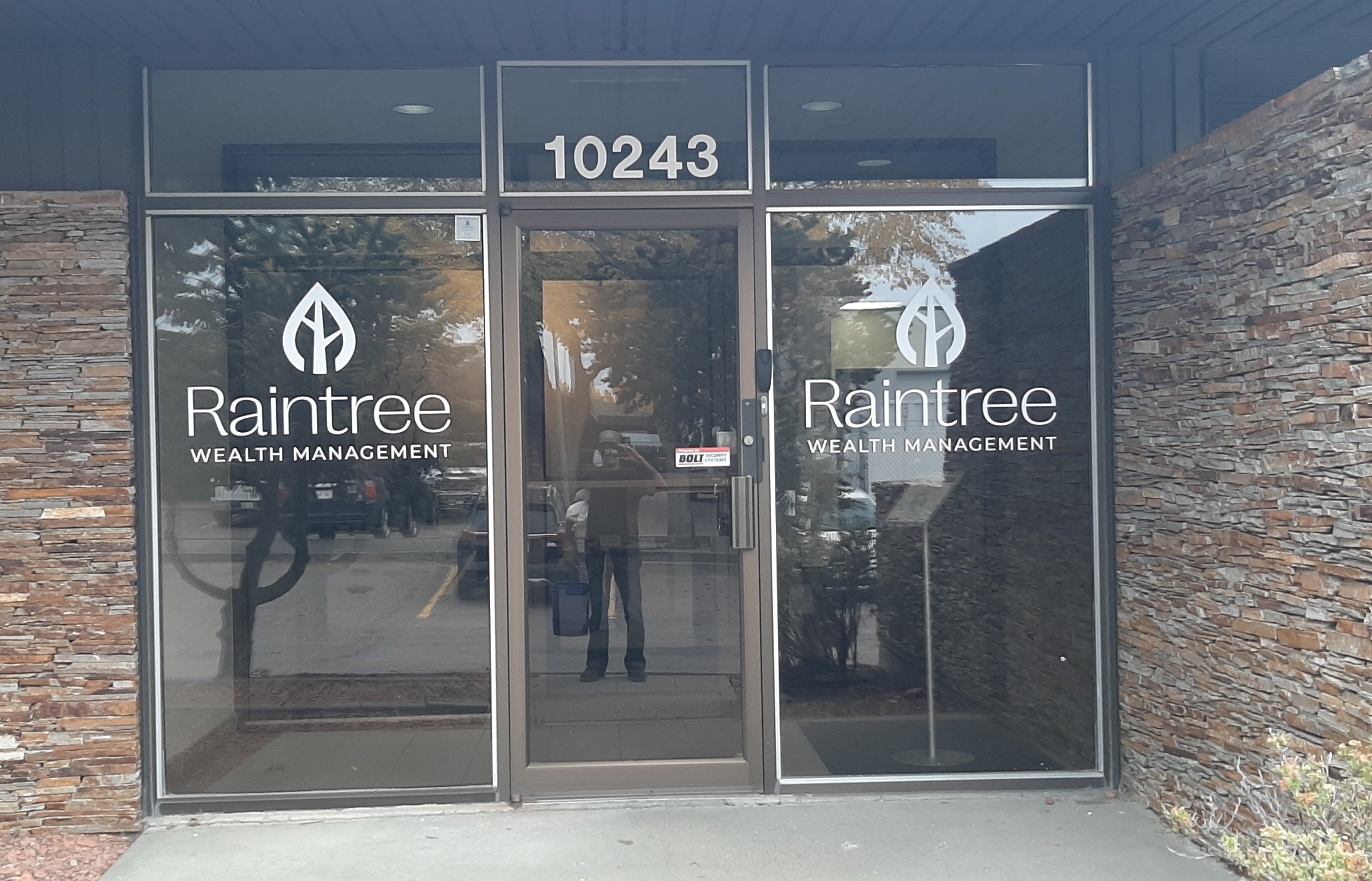 Window & Door Graphics for Raintree Financial Solutions in Edmonton, AB