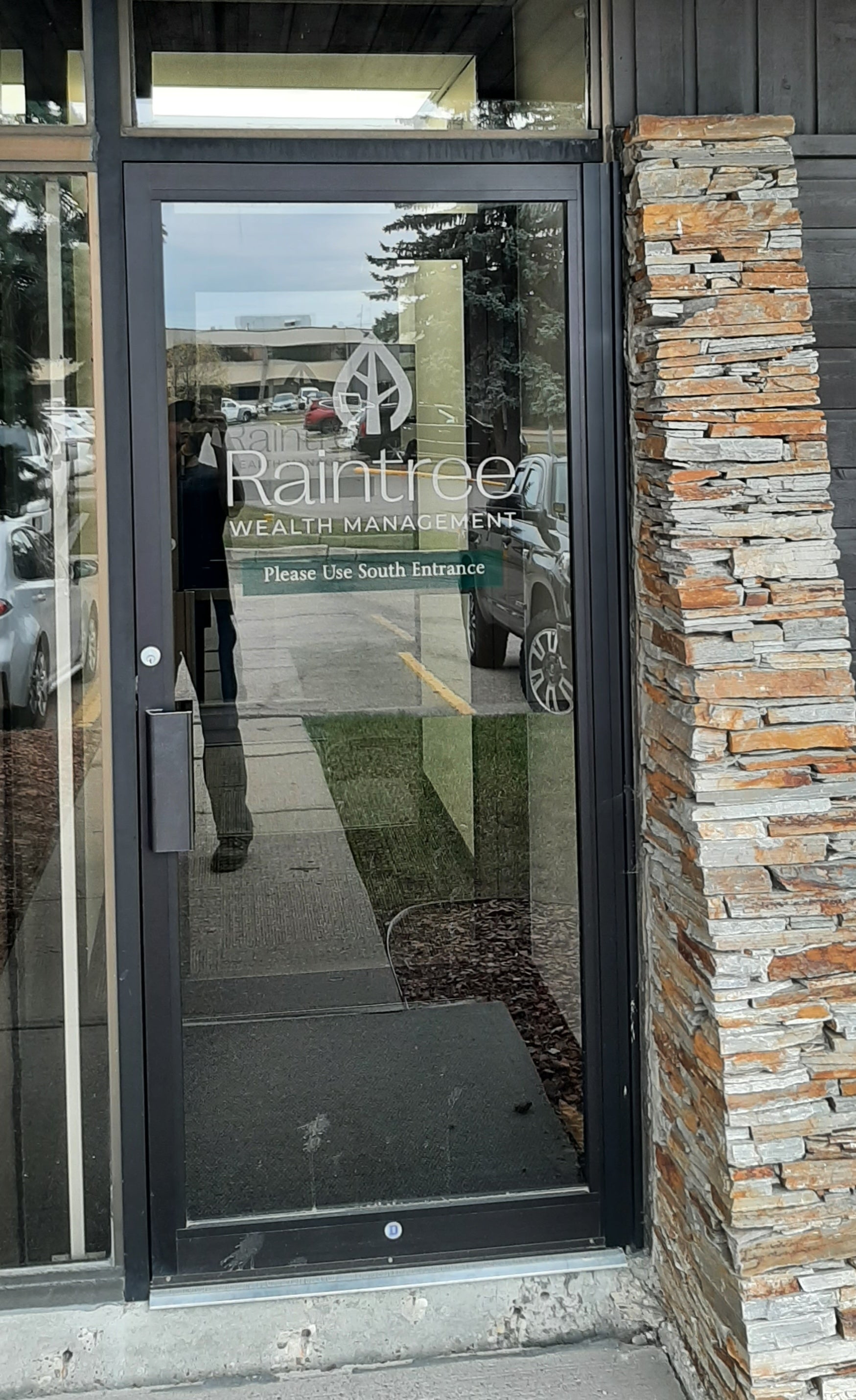 Window & Door Graphics for Raintree Financial Solutions in Edmonton, AB