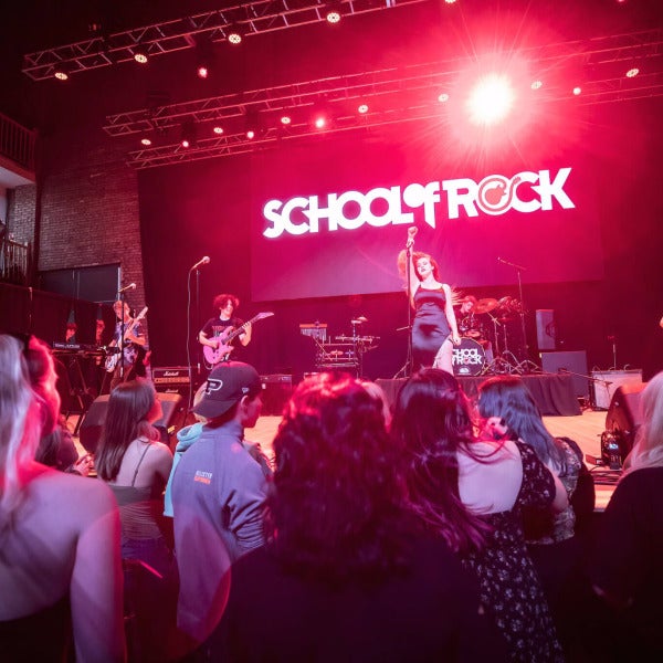 Dynamic Duo Jason Kline and Cecelia Yi Rock the Franchise World as School of Rock Franchisees of the Year