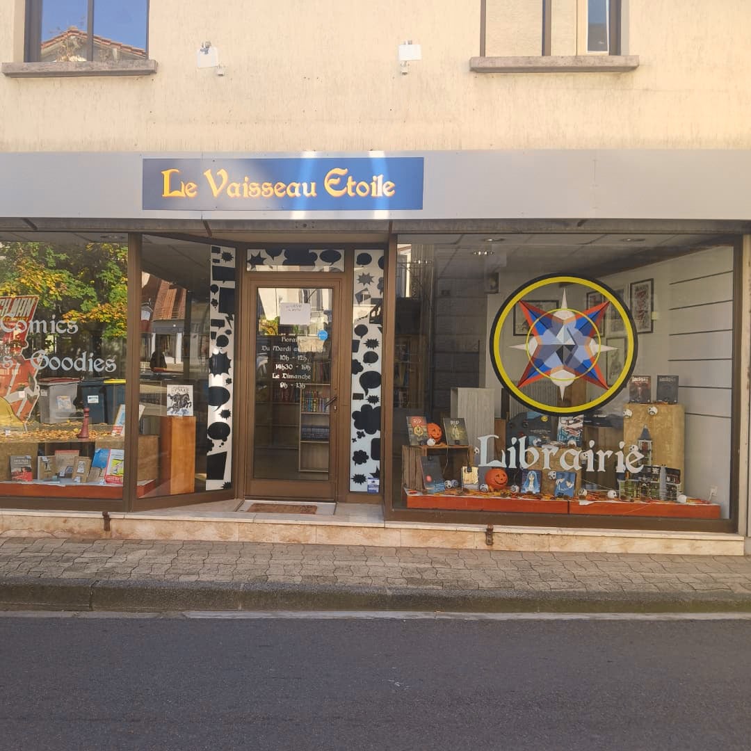 Enseigne et vitrine ouverture  librairie