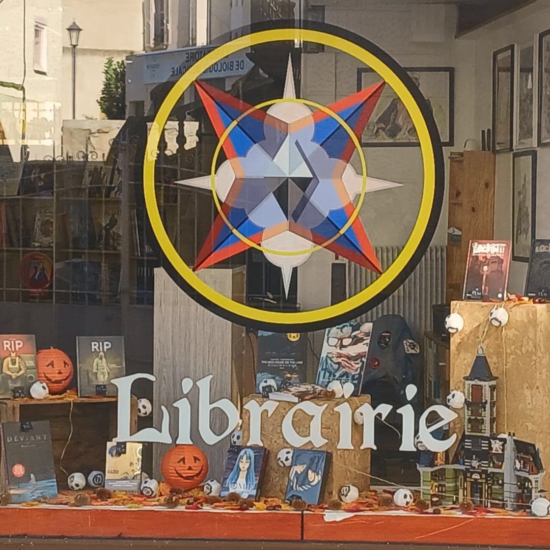 Enseigne et vitrine ouverture  librairie