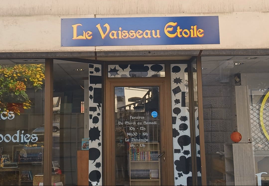Enseigne et vitrine ouverture  librairie