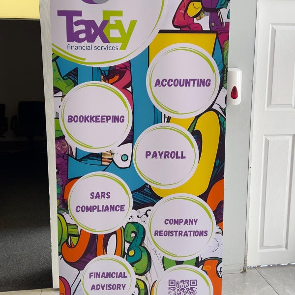 The team had a blast creating this colorful and creative pull-up banner!