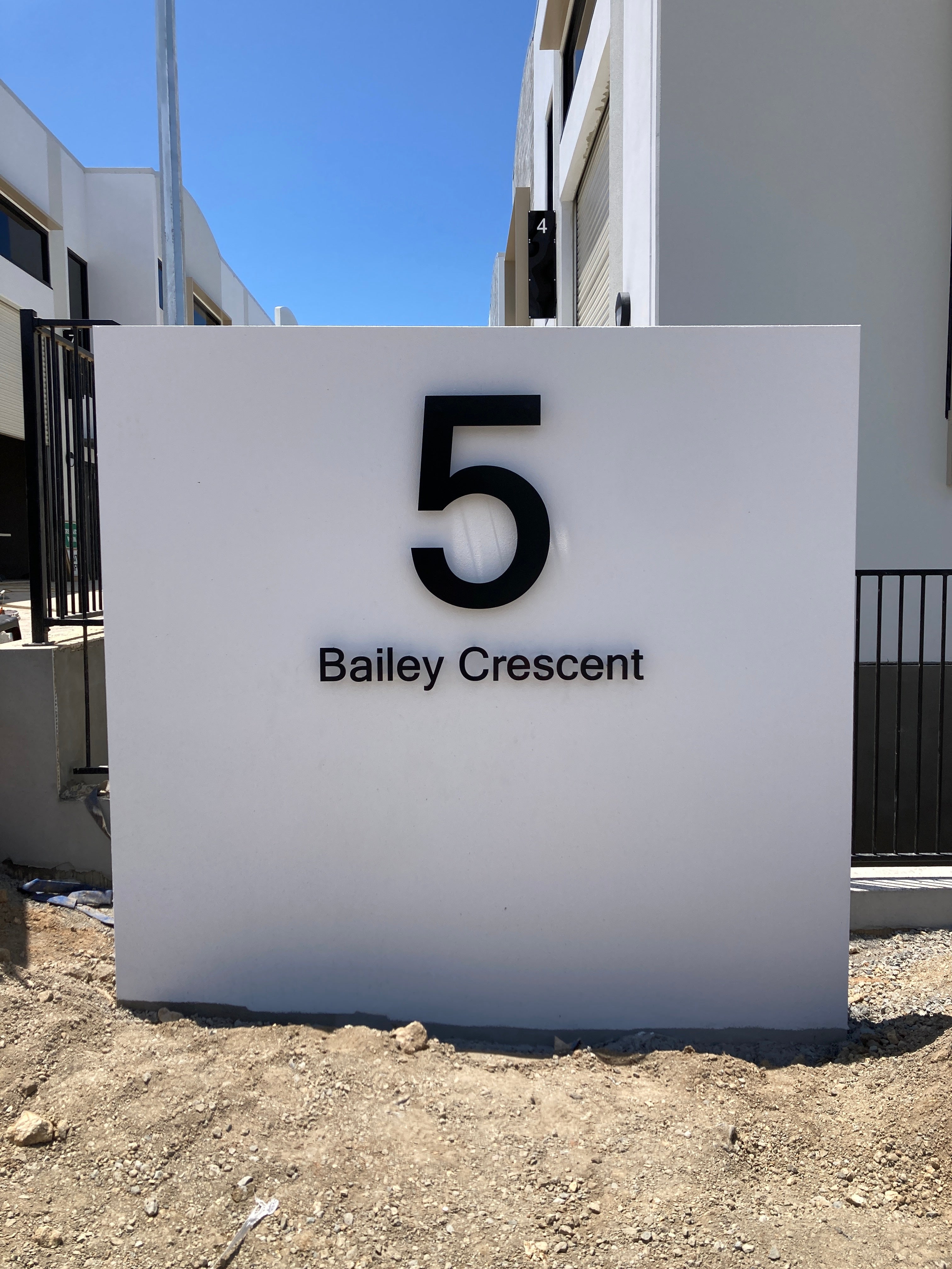 Commercial warehouse complex metal signs