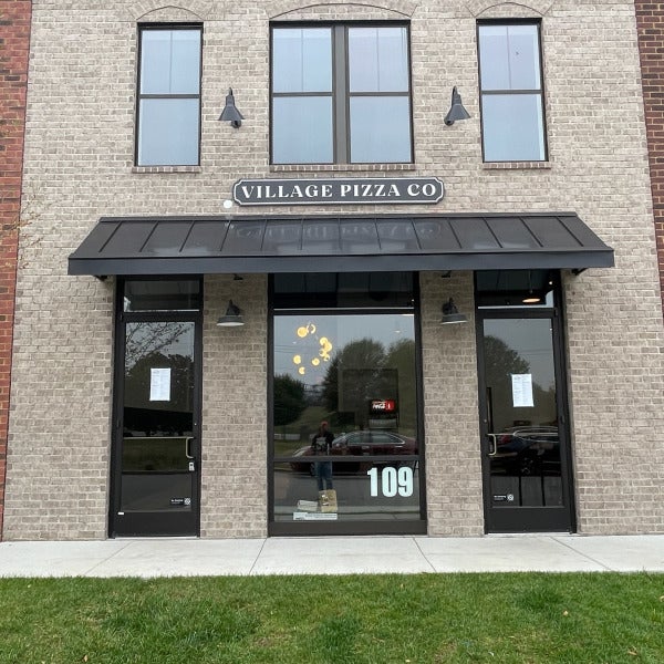 Village Pizza Exterior Sign
