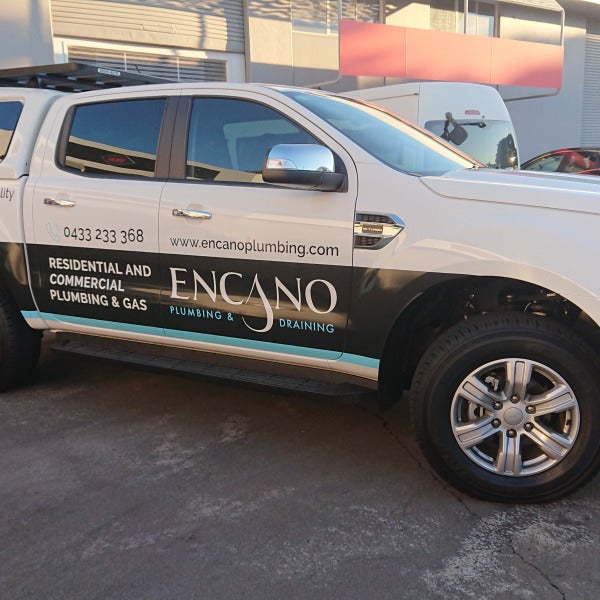 Check out this eye-catching half wrap on a local business's ute!