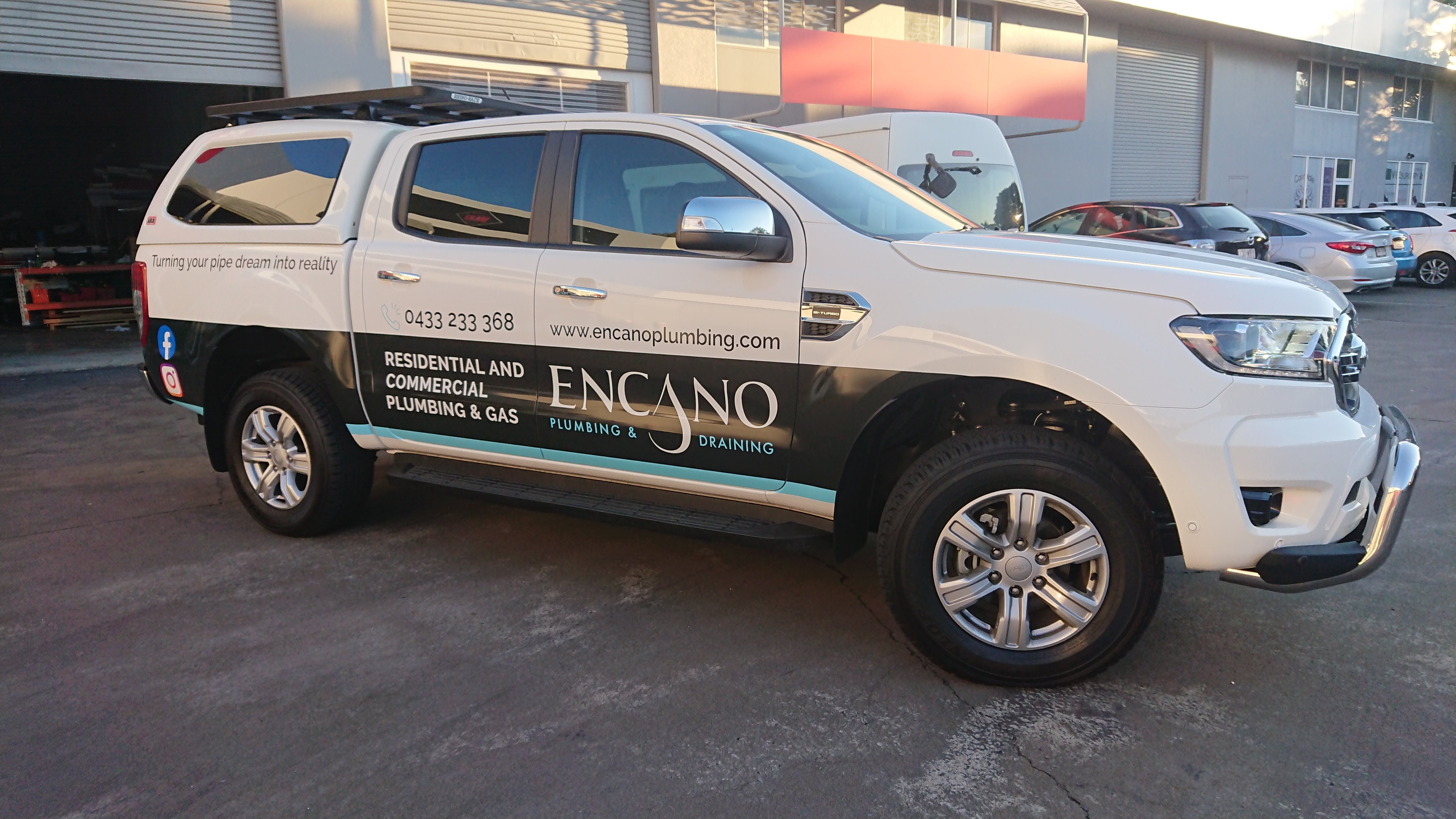 Check out this eye-catching half wrap on a local business's ute!