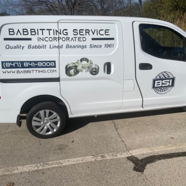 Babbitting Service Inc. Van Passenger Side