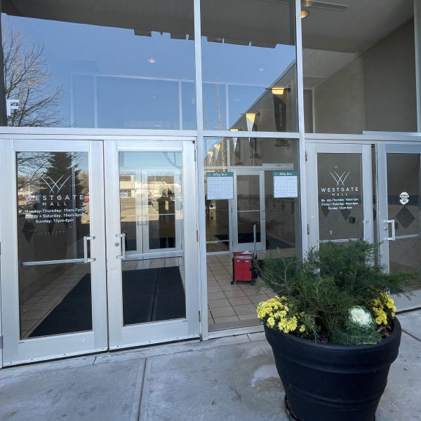 Holiday Hours Window Decal Install