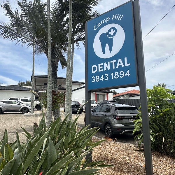 Illuminated pylon sign for Camp Hill Dental featuring the logo and mobile number custom from Signarama Brendale.