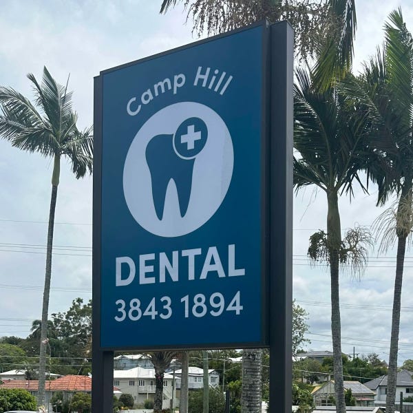Illuminated pylon sign by Signarama Brendale for Camp Hill Dental featuring the logo and mobile number.
