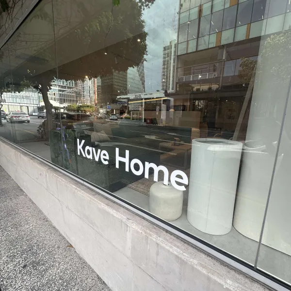 Vinyl graphics applied to window of Kava Home showroom by Signarama Brendale.