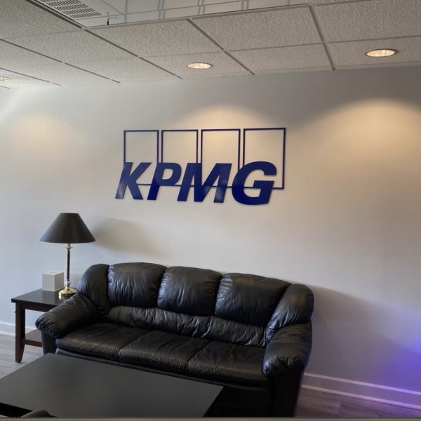 Sleek Acrylic Sign Enhances KPMG’s Capital One Arena Suite in Washington, DC