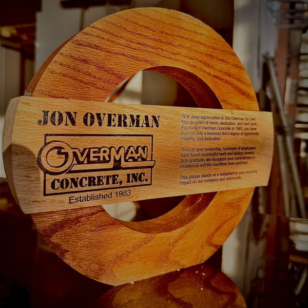 Custom wooden Overman Concrete Inc. anniversary sign