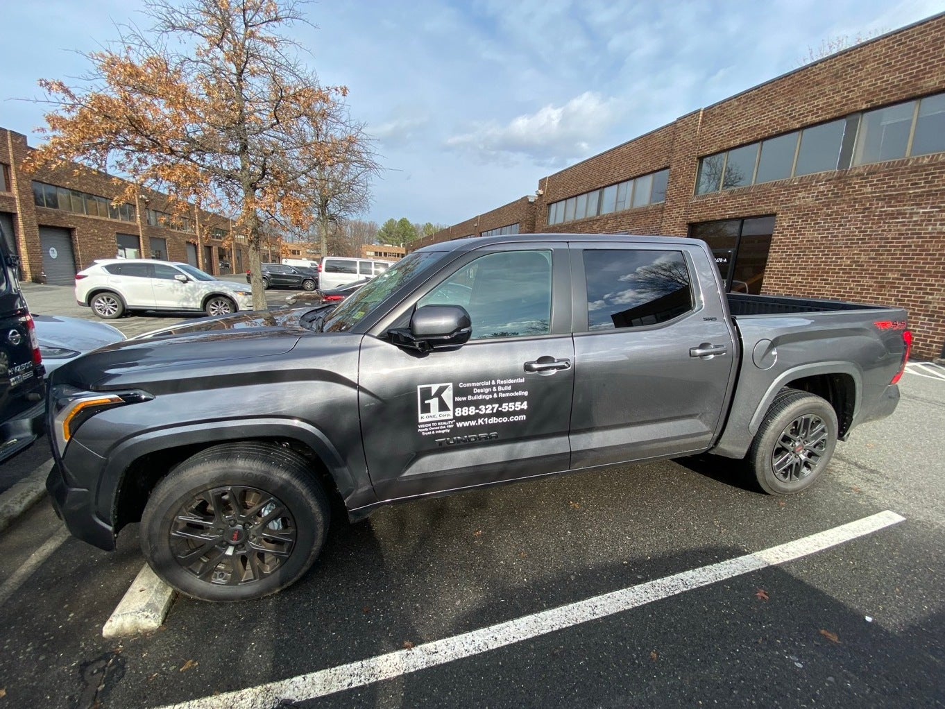 Drive Your Brand Forward: Custom Vehicle Graphics for K-ONE Construction