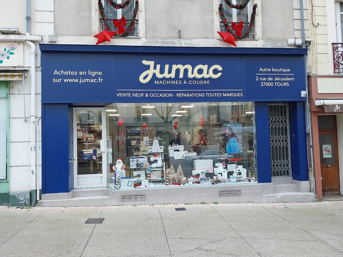 Conception et pose d'une enseigne lumineuse en lettres rétro éclairées pour Jumac, le spécialiste des machines à coudre installé sur Le Mans