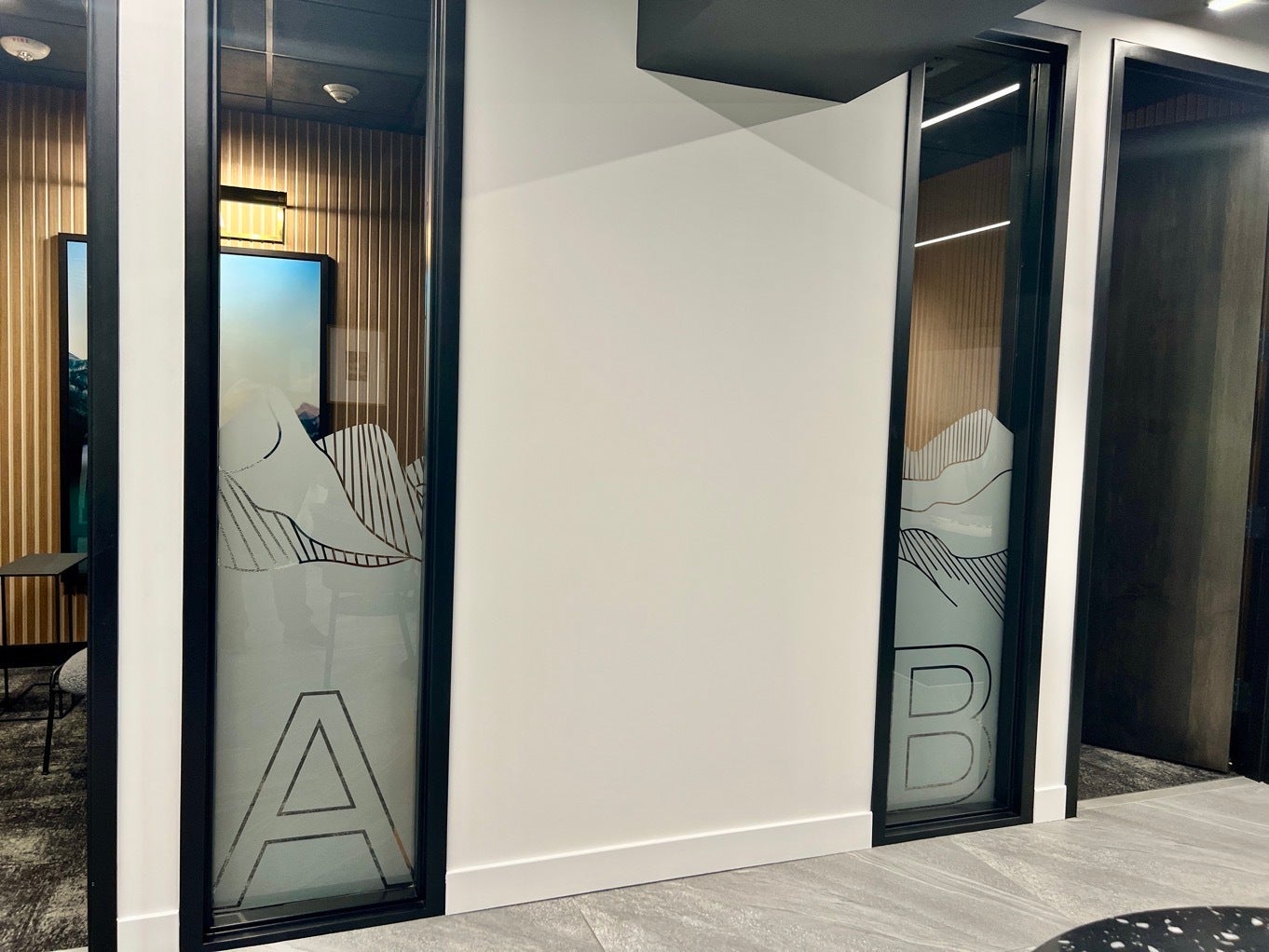 Enhancing Workspace with Frosted Privacy Graphics - KORE Bellevue Technology Center, Bellevue, WA