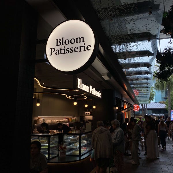 Round Blade lightbox mounted to the wall at Shopping Centre