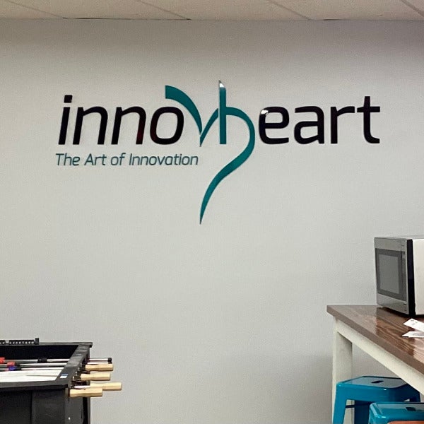 Newton InnovHeart Dimensional Logo Letters lobby reception sign