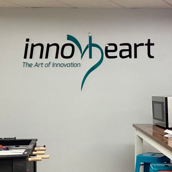 Newton InnovHeart Dimensional Logo Letters lobby reception sign